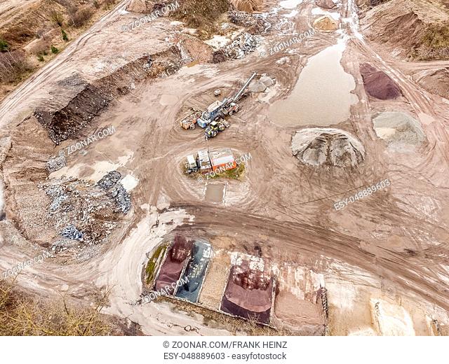 Destroyed scenery with fields, aerial photo of a sandy pit with Abbaumaschunen, destruction of the environment