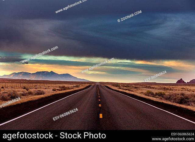 Road in the prairie country. Deserted natural travel background