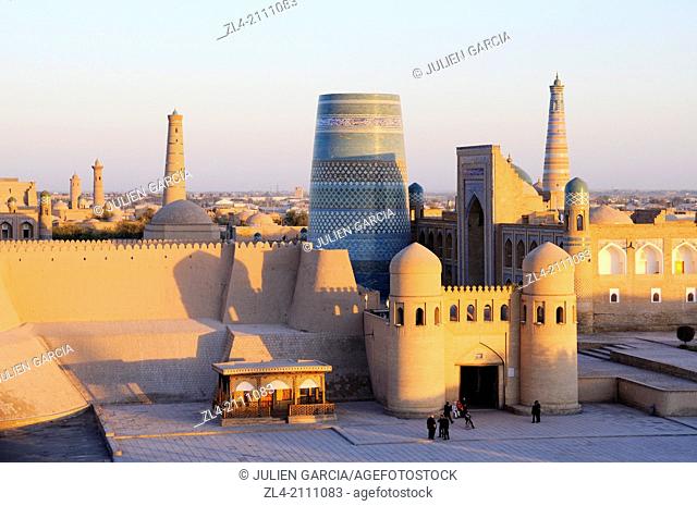 Walled city of Khiva viewed from the West Gate in the evening. Uzbekistan, Khorezm, Khiva, Itchan Kala (inner town)