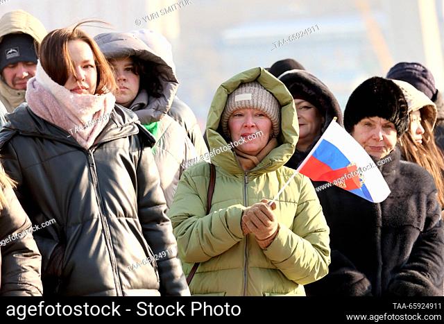 RUSSIA, VLADIVOSTOK - DECEMBER 20, 2023: People attend a ceremony to welcome the Russian destroyers Admiral Panteleyev and Admiral Tributs