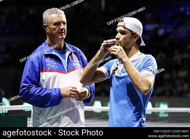 Czech tennis player Tomas Machac, right, and non-playing captian Jaroslav Navratil, left, are seen during the final group match of the men's Davis Cup 2023...