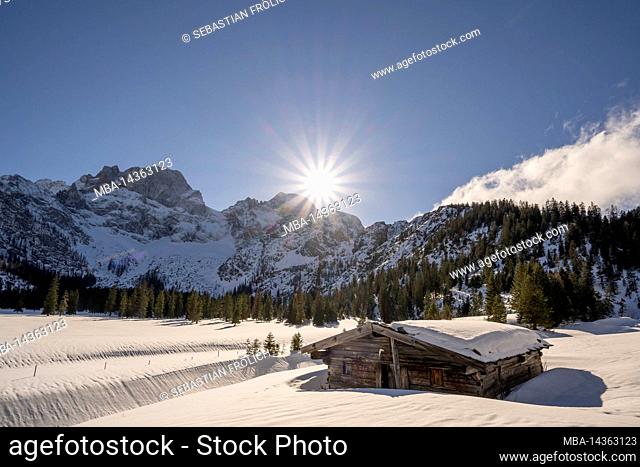 A small old wooden hut in the Rhone Valley, near Hinterriss in the Karwendel, a part of the Alps in Austria in winter with snow