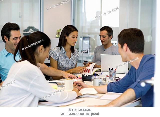 Business associates in casual meeting