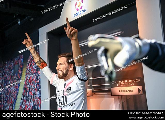 11 August 2021, Berlin: The wax figure of footballer Lionel Messi wears the jersey of Paris Saint-Germain at Madame Tussauds Berlin