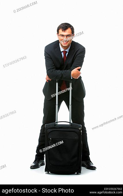 handsome businessman in suit with travel suitcase isolated on white background. studio sht. copy space