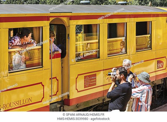 France, Pyrenees Orientales, Natural regional park Catalan Pyrenees, Tet Valley, Mont Louis La Cabanasse, Le Train Jaune, tourists enjoying the Yellow Train