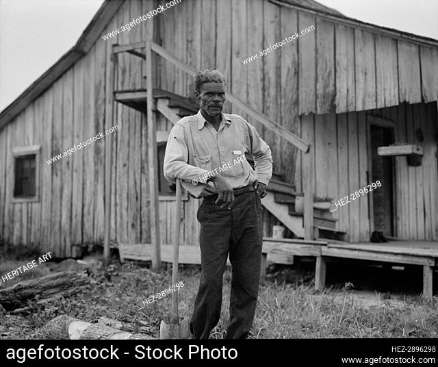 Cotton worker in Sunday clothes, near Blytheville, Arkansas, 1937. Creator: Dorothea Lange