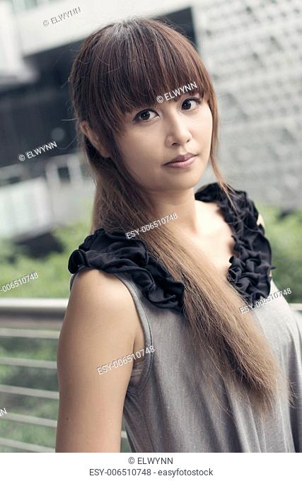 Attractive Asian woman in modern city, Taipei, Taiwan, Asia