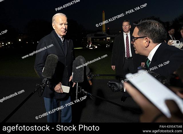 United States President Joe Biden takes a question from CBS Correspondent Ed O'Keefe as he returns to The White House in Washington, DC
