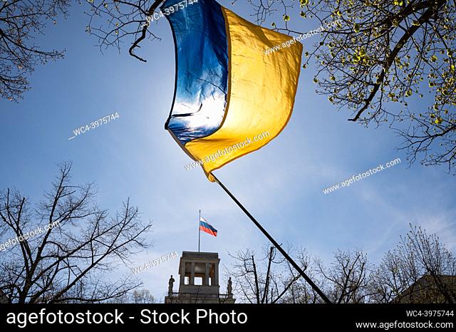 Berlin, Germany, Europe - A Ukrainian national flag waves in front of the Russian embassy on the boulevard Unter den Linden in Mitte district as a sign of...