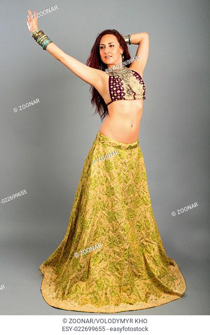 Young beautiful belly dancer