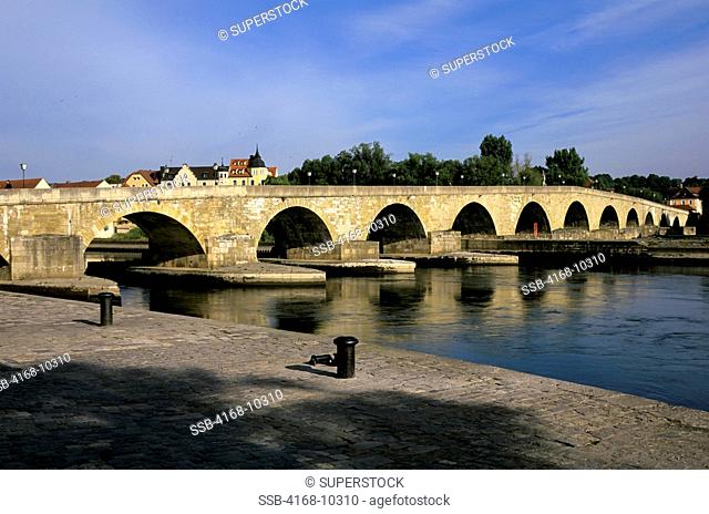 Germany, Bavaria, Danube River, Regensburg, View Of 12Th Century Stone Bridge