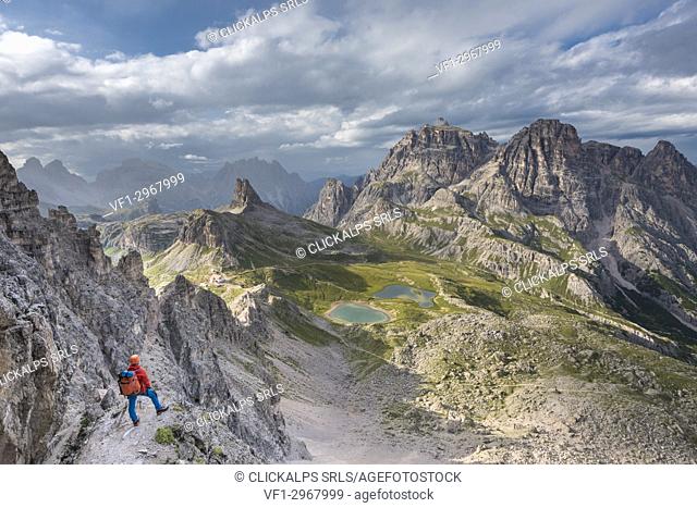 Sesto / Sexten, province of Bolzano, Dolomites, South Tyrol, Italy. Climber on the via ferrata ""De Luca-Innerkofler"" to the Mount Paterno