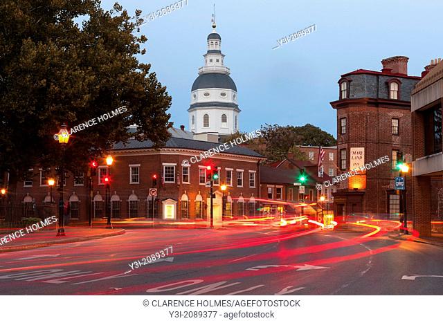 Evening traffic on Church Circle in Annapolis, Maryland creates streaks of light in front of the Maryland State House, opened in 1772