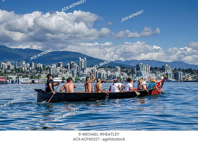 Many People, One Canoe. Salish First Nations, Gathering of Canoes to Protect the Salish Sea, Burrard Inlet, North Vancouver, British Columbia, Canada