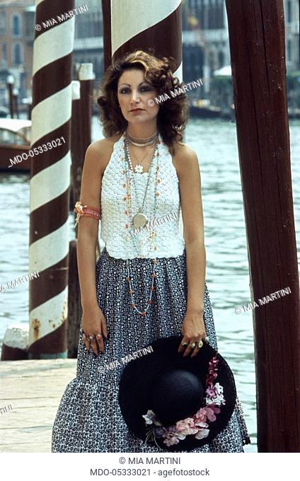 The singer Mia Martini (Domenica Rita Adriana Bertè) on a pier. Venice, Italy. 1973