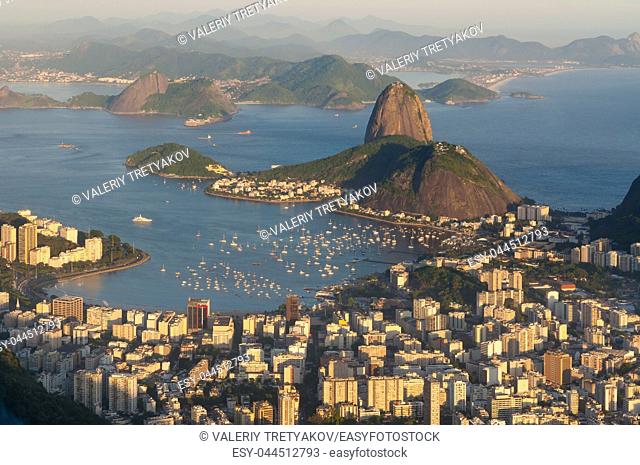 Panoramic view of Rio de Janeiro and Sugar Loaf mountain from Corcovado at Sunset
