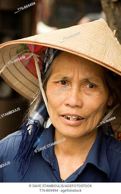 portrait of a Vietnamese vendor in Hanoi