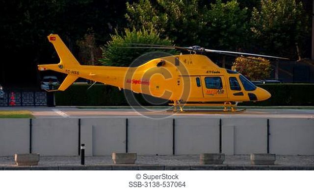 Agusta A19 Koala helicopter at a palace, Ciragan Palace, Istanbul, Turkey