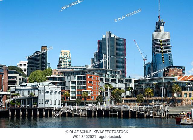 Sydney, New South Wales, Australia - View of the northern business district and new buildings along the harbourfront as well as the Crown Sydney project still...