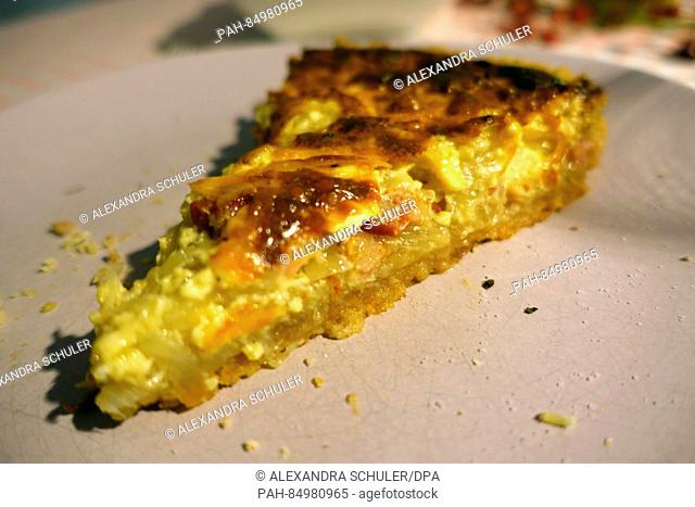 A piece of onion cake lies on a plate in Oberkirch, Germany, 13 October 2016. The savoury cake is mostly eaten in southern Germany, in Switzerland and in Alsace