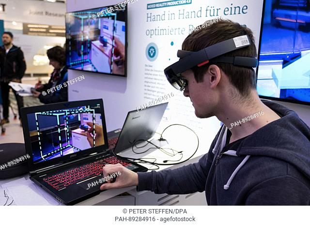 Glasses that register the gesture of the person wearing it and using it as control input are presented at the stand of the German ministry of education and...