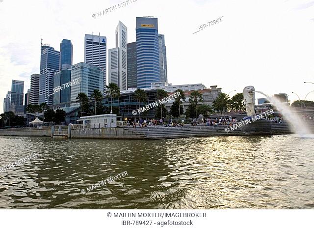 Financial District of Singapore on the Marina Bay behind the statue of Merlion, half fish and half lion, mascot of Singapore, Southeast Asia