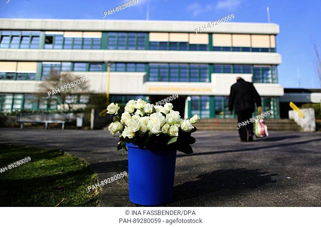 White roses can be seen outside the Joseph Koenig secondary school in Haltern am See, Germany, 24 March 2017. On the occasion of the second anniversary of the...