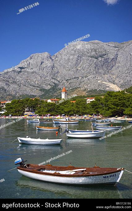 Village view with fishing boat, Promajna, Biokovo mountains, Makarska Riviera, Dalmatia, Croatian Adriatic coast, Croatia, Europe