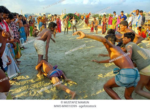 Young men playing Kabadi or Hadudu at Basila, outskirts of Dhaka, the capital city of Bangladesh Kabadi or Hadudu is the National game of Bangladesh August 29