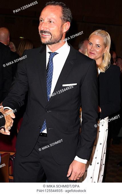 IKH Crown Princess Mette-Marit together with her husband Crown Prince Haakon of Norway on arrival to read her book ""Homeland""