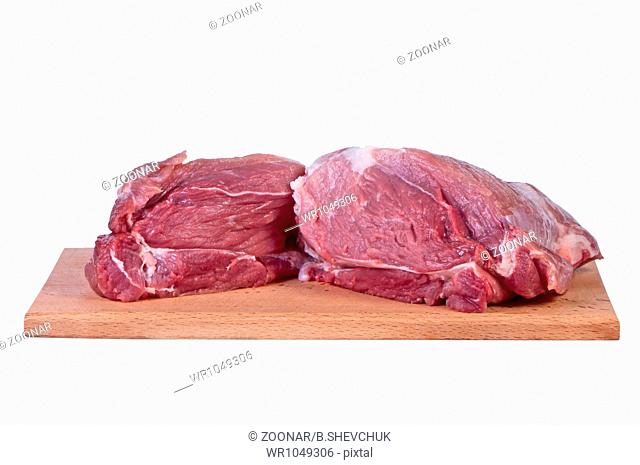 Raw meat on cutting board