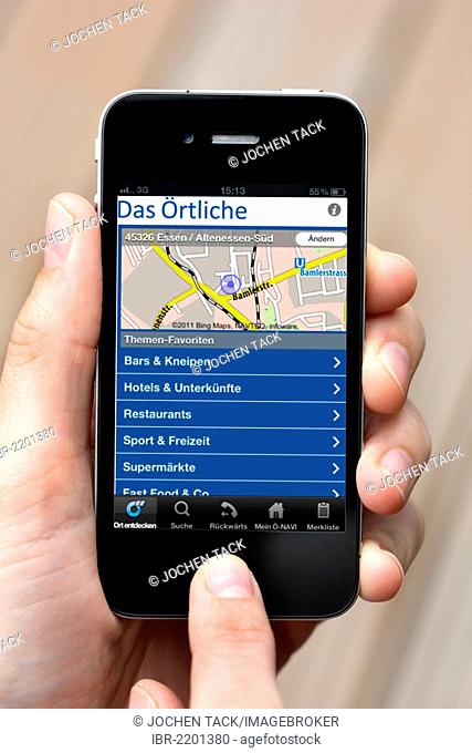 IPhone, smartphone, showing Das Oertliche, a German telephone book app on the display