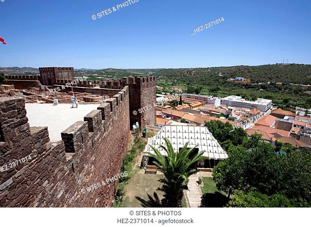 Silves Castle and the surrounding landscape, Silves, Portugal, 2009. With its red walls (since it was built out of red sandstone and dried mud) the imposing...