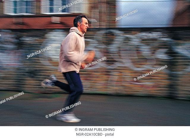 elderly man jogging