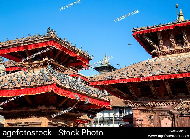 Kathmandu, Nepal - October 19, 2014: The roofs of two pagodas on Kathmandu Durbar Square