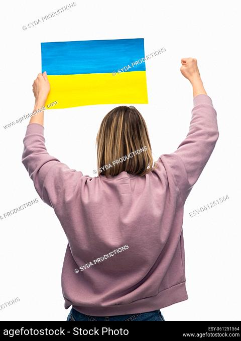 woman holding flag of ukraine on demonstration