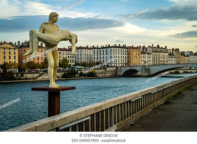 Rhone river and statue in Lyon in France in the summer