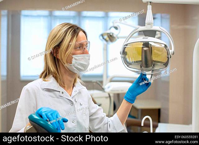 Dentist woman in the medical office. Medicine, stomatology and healthcare