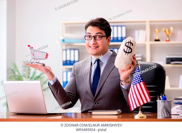 Businessman with American flag in office