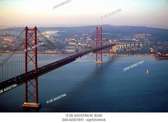 Aerial view of the 25th of April bridge over the Tagus river, 1962-1966, connecting Lisbon to Almada. Portugal, 20th century