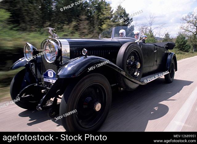 Hispano Suiza car rally - Santander to Madrid. A black sports model at speed