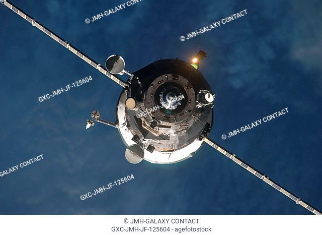 An unpiloted ISS Progress resupply vehicle approaches the International Space Station, bringing 1, 918 pounds of propellant, 110 pounds of oxygen