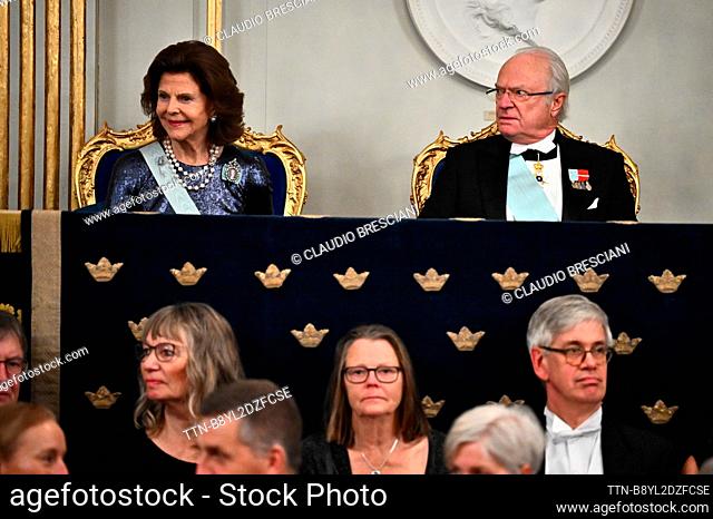 Queen Silvia and King Carl Gustaf attend the Swedish Academy's annual festive gathering in the Great Stock Exchange Hall in the Börshuset in Stockholm, Sweden