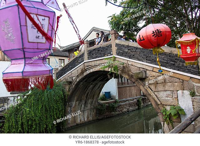 Traditional stone arch bridge Shantang canal area in Suzhou, China