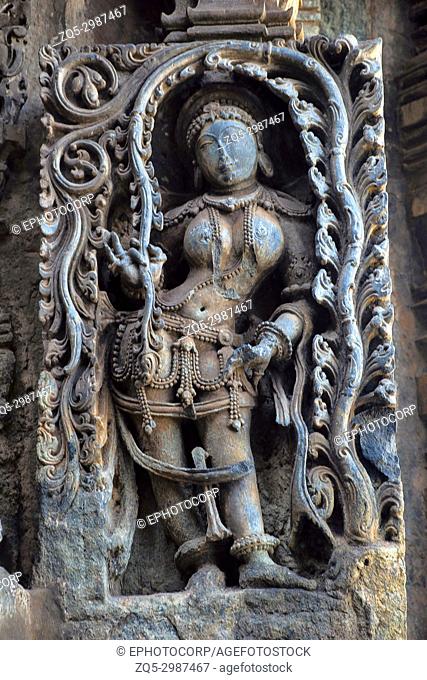 Madanika or Dancing girl under Foliage. Hoysalesvara Temple, Halebid, Karnataka, 12th Century. Shiva temple