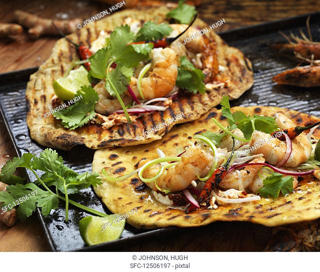 Grilled wraps with prawns, chilli peppers and coriander