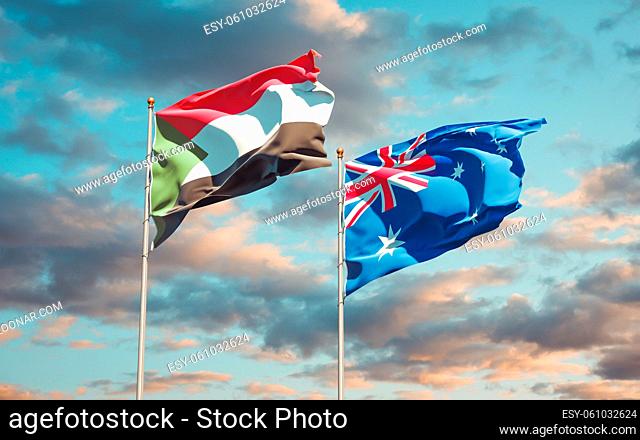 Beautiful national state flags of Sudan and Australia together at the sky background. 3D artwork concept