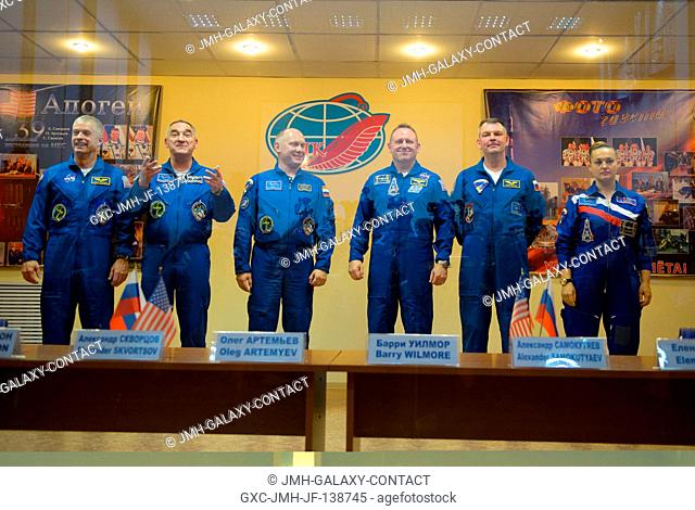 From the left, Expedition 39 Flight Engineer Steve Swanson of NASA, Soyuz Commander Alexander Skvortsov of the Russian Federal Space Agency (Roscosmos)