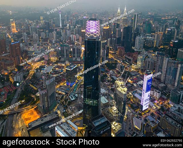 Bukit Bintang, Kuala Lumpur, Malaysia - Nov 28 2022: Exchange 106 tower is beautifully lit up at night in aerial view